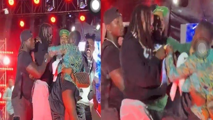Fan Storms Stage to Attack Naira Marley During Cotonou Concert